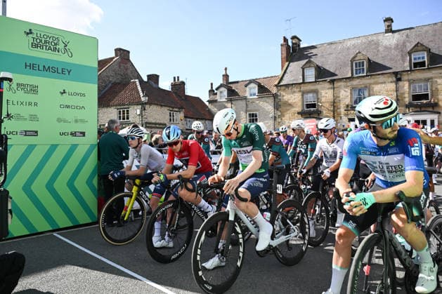 2026 Lloyds Tour of Britain Men Picture by Zac Williams SWpix.com - 05 09 2026 - Cycling - UCI ProSeries - 2026 Lloyds Tour of Britain Men - Stage 4: Helmsley to Leyburn (165.8km) - Lewis Askey (NSN Cycling Team) wearing the leaders jersey, Tim Merlier (Soudal Quick-Step) wearing the points jersey, Elliot Rowe (Great Britain national team, Nationalteam wearing the best young rider jersey, Michal Schuran (Team United Shipping) wearing the king of the mountains jersey, lining up in Helmsley Cycling Copyright: x xSWpix.comx(t axPhotographyxHubxLtd)xZacxWilliams SWpix.comx SWP-3030-22389