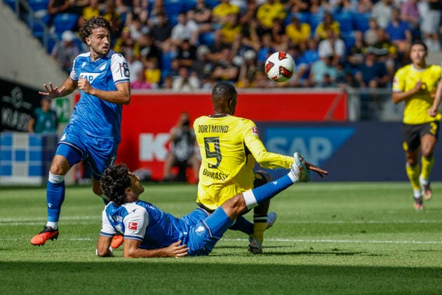 Ramy Bensebaini (BVB Dortmund, 05) und Serhou Guirassy (BVB Dortmund, 09) im Zweikampf , Deutschland, Fussball, 1. Bundesliga, 2.Spieltag, 2026 2027, TSG Hoffenheim vs. Borussia Dortmund, 05.09.2026, Sinsheim SNP Arena Deutschland *** Ramy Bensebaini (BVB Dortmund, 05) and Serhou Guirassy (BVB Dortmund, 09) in a tackle, Germany, Soccer, Bundesliga 1, Matchday 2, 2026–2027, TSG Hoffenheim vs. Borussia Dortmund, September 5, 2026, Sinsheim SNP Arena, Germany Copyright: xGrantxHubbsx