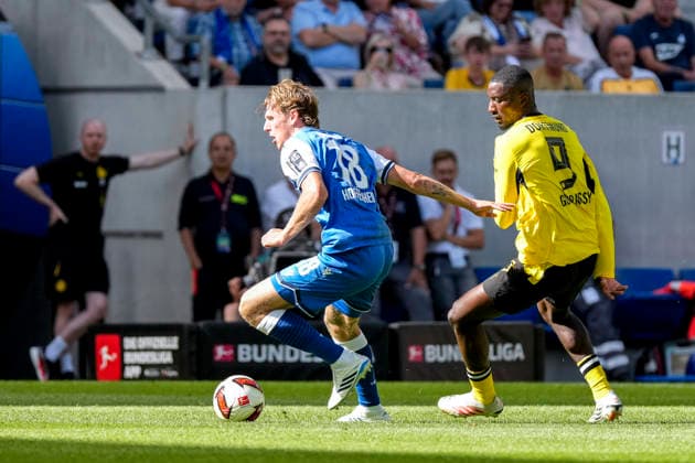 v.li.: Wouter Burger (Hoffenheim, 18), Serhou Guirassy (BVB, 9), Zweikampf, Spielszene, Duell, duel, tackle, tackling, Dynamik, Action, Aktion, 05.09.2026, Sinsheim (Deutschland), Fussball, Bundesliga, TSG 1899 Hoffenheim - Borussia Dortmund, DFB DFL REGULATIONS PROHIBIT ANY USE OF PHOTOGRAPHS AS IMAGE SEQUENCES AND OR QUASI-VIDEO. *** From left: Wouter Burger (Hoffenheim), 18, Serhou Guirassy (BVB), 9, tackle, game scene, duel, tackle, tackling, dynamism, action, 05 09 2026, Sinsheim, Germany, soccer, Bundesliga, TSG 1899 Hoffenheim vs. Borussia Dortmund, DFB and DFL regulations prohibit any use of photographs as image sequences and or quasi-video xozx