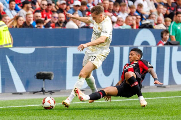 LEVERKUSEN, GERMANY - SEPTEMBER 5, 2026 : Michel Aebischer (1. FC Union Berlin, 20) and Equi Fernández (Bayer 04 Leverkusen, 6) tackling during the German Bundesliga match on gameday 2 between Bayer 04 Leverkusen vs. 1. FC Union Berlin at BayArena on September 5, 2026 in Leverkusen, Germany. DFL REGULATIONS PROHIBIT ANY USE OF PHOTOGRAPHS AS IMAGE SEQUENCES AND OR QUASI-VIDEO. Northrhine-Westphalia Germany Copyright: xAxelxKohringx