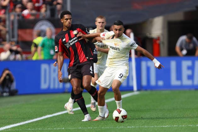 Jarell Quansah (Bayer 04 Leverkusen) und Livan Burcu (1.FC Union Berlin) im Zweikampf waehrend des Spiels der 1. Bundesliga zwischen Bayer 04 Leverkusen und 1. FC Union Berlin, BayArena am 05. September 2026 in Leverkusen, Deutschland. (Foto von Oliver Kaelke DeFodi Images) +++ Jarell Quansah (Bayer 04 Leverkusen) und Livan Burcu (1.FC Union Berlin) battle for the ball during the Bundesliga match between Bayer 04 Leverkusen and 1. FC Union Berlin at BayArena on September 5, 2026 in Leverkusen, Germany. (Photo by Oliver Kaelke DeFodi Images) DFB DFL REGULATIONS PROHIBIT ANY USE OF PHOTOGRAPHS AS IMAGE SEQUENCES AND OR QUASI-VIDEO. (Photo by Oliver Kaelke DeFodi Images) - *** Jarell Quansah of Bayer 04 Leverkusen and Livan Burcu of 1. FC Union Berlin battle for the ball during the Bundesliga match between Bayer 04 Leverkusen and 1. FC Union Berlin at the BayArena on September 5, 2026, in Leverkusen, Germany. Photo by Oliver Kaelke, DeFodi Images. Jarell Quansah of Bayer 04 Leverkusen and Livan Burcu of 1. FC Union Berlin battle for the ball during the Bundesliga match between Bayer 04 Leverkusen and 1. FC Union Berlin at BayArena on September 5, 2026 in Leverkusen, Germany. Photo by Oliver Kaelke, DeFodi Images. DFB and DFL regulations prohibit any use of photographs as image sequences and or quasi-video. Photo by Oliver Kaelke, DeFodi Images.