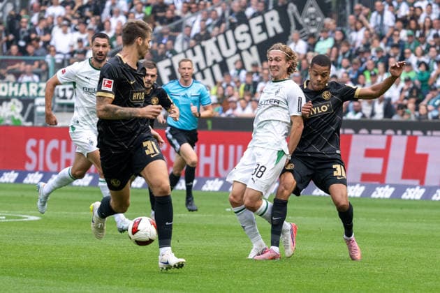 Zweikampf zwischen Hugo Bolin (Borussia Moenchengladbach, 38) und Jan Gyamerah(SV Elversberg, 30). Borussia Moenchengladbach vs. SV Elversberg, Fussball, 1. Bundesliga, 02. Spieltag, Saison 2026 2027, 05.09.2026 DFL DFB Regulations prohibit any use of Photographs as image sequences and or Quasivideo Borussia Moenchengladbach vs. SV Elversberg, Fussball, 1. Bundesliga, 02. Spieltag, Saison 2026 2027, 05.09.2026 Moenchengladbach *** Tackle between Hugo Bolin of Borussia Mönchengladbach, 38, and Jan Gyamerah of SV Elversberg, 30; Borussia Mönchengladbach vs. SV Elversberg, soccer, Bundesliga 1, Matchday 2, 2026–2027 season, September 5, 2026 DFL DFB regulations prohibit any use of photographs as image sequences and or quasi-video Borussia Mönchengladbach vs. SV Elversberg, soccer, Bundesliga 1, Matchday 2, 2026–2027 season, September 5, 2026, Mönchengladbach Copyright: xEibner-Pressefoto ThomasxHaeslerx EP_THR
