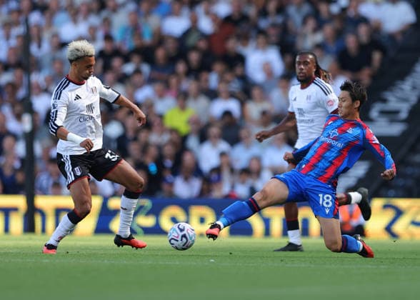 5th September 2026; Craven Cottage, Fulham, London, England; Premier League Football, Fulham versus Crystal Palace; Daichi Kamada of Crystal Palace challenges Antonee Robinson of Fulham JohnxPatrickxFletcher