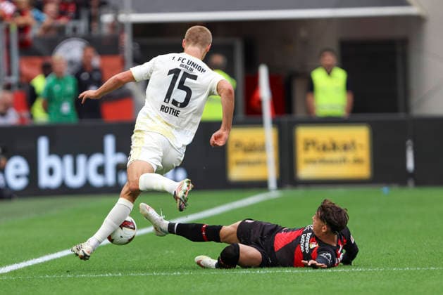 Tom Rothe (1.FC Union Berlin) und Afonso Moreira (Bayer 04 Leverkusen) im Zweikampf waehrend des Spiels der 1. Bundesliga zwischen Bayer 04 Leverkusen und 1. FC Union Berlin, BayArena am 05. September 2026 in Leverkusen, Deutschland. (Foto von Oliver Kaelke DeFodi Images) +++ Tom Rothe (1.FC Union Berlin) und Afonso Moreira (Bayer 04 Leverkusen) battle for the ball during the Bundesliga match between Bayer 04 Leverkusen and 1. FC Union Berlin at BayArena on September 5, 2026 in Leverkusen, Germany. (Photo by Oliver Kaelke DeFodi Images) DFB DFL REGULATIONS PROHIBIT ANY USE OF PHOTOGRAPHS AS IMAGE SEQUENCES AND OR QUASI-VIDEO. (Photo by Oliver Kaelke DeFodi Images) - *** Tom Rothe of 1 FC Union Berlin and Afonso Moreira of Bayer 04 Leverkusen battle for the ball during the Bundesliga match between Bayer 04 Leverkusen and 1 FC Union Berlin at the BayArena on September 5, 2026, in Leverkusen, Germany. Photo by Oliver Kaelke, DeFodi Images. Tom Rothe of 1. FC Union Berlin and Afonso Moreira of Bayer 04 Leverkusen battle for the ball during the Bundesliga match between Bayer 04 Leverkusen and 1. FC Union Berlin at BayArena on September 5, 2026 in Leverkusen, Germany. Photo by Oliver Kaelke, DeFodi Images. DFB and DFL regulations prohibit any use of photographs as image sequences and or quasi-video. Photo by Oliver Kaelke, DeFodi Images.