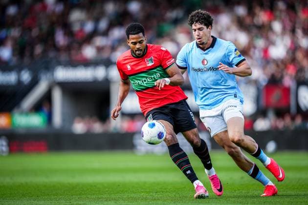 NIJMEGEN , 05-09-2026 , Stadium De Goffert , season 2026 2027 , Dutch Eredivisie football , match between NEC Nijmegen and Feyenoord Rotterdam , picture shows NEC Nijmegen player Almugera Kabar and Feyenoord player Nacho Ferri NEC - Feyenoord  x206499189x Copyright: