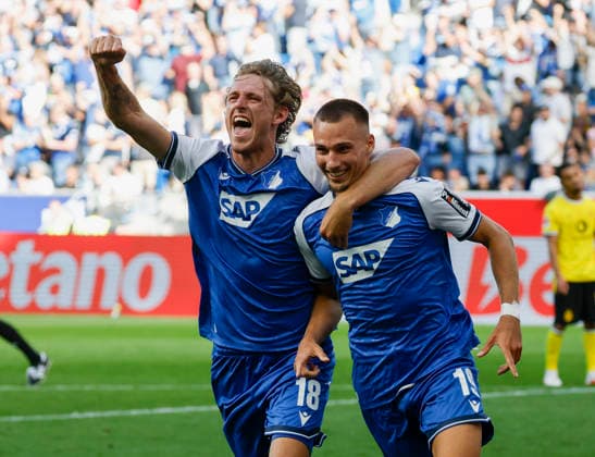 Im Bild: Jubel nach dem Tor zum 2:0 bei v.li. Wouter Burger (TSG 1899 Hoffenheim, 18) und Torschuetze Tim Lemperle (TSG 1899 Hoffenheim, 19) 05.09.2026, TSG 1899 Hoffenheim - Borussia Dortmund, 1. Bundesliga, 2. Spieltag, Deutschland, Sinsheim, SNP Arena, DFL REGULATIONS PROHIBIT ANY USE OF PHOTOGRAPHS AS IMAGE SEQUENCES AND OR QUASI-VIDEO. *** Pictured: Celebrations after the goal that made it 2–0, from left to right: Wouter Burger (TSG 1899 Hoffenheim, 18) and goal scorer Tim Lemperle (TSG 1899 Hoffenheim, 19), May 9, 2026, TSG 1899 Hoffenheim vs. Borussia Dortmund, Bundesliga 1, Matchday 2, Germany, Sinsheim, SNP Arena, DFL regulations prohibit any use of photographs as image sequences and or quasi-video Copyright: HMBxMedia xJulienxBecker