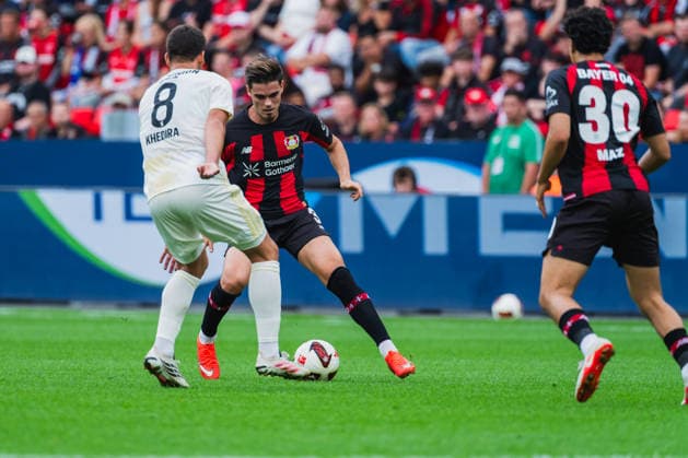 Rani Khedira (1.FC Union Berlin, 08) und Miguel Guiterrez (Bayer 04 Leverkusen, 03) im Zweikampf, Ibrahim Maza (Bayer 04 Leverkusen, 30) Bayer 04 Leverkusen vs. 1.FC Union Berlin, Fussball, 1.Bundesliga, 2.Spieltag, Saison 2026 27, 05.09.2026, DFL REGULATIONS PROHIBIT ANY USE OF PHOTOGRAPHS AS IMAGE SEQUENCES AND OR QUASI-VIDEO, Bayer 04 Leverkusen vs. 1.FC Union Berlin, Fussball, 1.Bundesliga, 2.Spieltag, Saison 2026 27, 05.09.2026 Leverkusen *** Rani Khedira (1. FC Union Berlin, No. 08) and Miguel Guiterrez (Bayer 04 Leverkusen, No. 03) in a tackle; Ibrahim Maza (Bayer 04 Leverkusen, No. 30) – Bayer 04 Leverkusen vs. 1. FC Union Berlin, soccer, 1. Bundesliga, Matchday 2, 2026–27 season, May 9, 2026, DFL REGULATIONS PROHIBIT ANY USE OF PHOTOGRAPHS AS IMAGE SEQUENCES AND OR QUASI-VIDEO, Bayer 04 Leverkusen vs. 1. FC Union Berlin, soccer, Bundesliga 1, Matchday 2, 2026–27 season, May 9, 2026, Leverkusen Copyright: xEibner-Pressefoto LukasxBaldygax EP_LBA