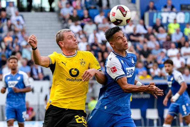Sport Bilder des Tages v.li.: Julian Ryerson (BVB, 26), Adam Daghim (Hoffenheim, 14), Zweikampf, Spielszene, Duell, duel, tackle, tackling, Dynamik, Action, Aktion, 05.09.2026, Sinsheim (Deutschland), Fussball, Bundesliga, TSG 1899 Hoffenheim - Borussia Dortmund, DFB DFL REGULATIONS PROHIBIT ANY USE OF PHOTOGRAPHS AS IMAGE SEQUENCES AND OR QUASI-VIDEO. *** From left: Julian Ryerson (BVB), 26; Adam Daghim (Hoffenheim), 14; tackle, game scene, duel, tackle, tackling, dynamics, action, 05 09 2026, Sinsheim, Germany, soccer, Bundesliga, TSG 1899 Hoffenheim vs. Borussia Dortmund, DFB and DFL regulations prohibit any use of photographs as image sequences and or quasi-video xozx
