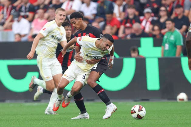 Livan Burcu (1.FC Union Berlin) und Jarell Quansah (Bayer 04 Leverkusen) im Zweikampf waehrend des Spiels der 1. Bundesliga zwischen Bayer 04 Leverkusen und 1. FC Union Berlin, BayArena am 05. September 2026 in Leverkusen, Deutschland. (Foto von Oliver Kaelke DeFodi Images) +++ Livan Burcu (1.FC Union Berlin) und Jarell Quansah (Bayer 04 Leverkusen) battle for the ball during the Bundesliga match between Bayer 04 Leverkusen and 1. FC Union Berlin at BayArena on September 5, 2026 in Leverkusen, Germany. (Photo by Oliver Kaelke DeFodi Images) DFB DFL REGULATIONS PROHIBIT ANY USE OF PHOTOGRAPHS AS IMAGE SEQUENCES AND OR QUASI-VIDEO. (Photo by Oliver Kaelke DeFodi Images) - *** Livan Burcu of 1 FC Union Berlin and Jarell Quansah of Bayer 04 Leverkusen battle for the ball during the Bundesliga match between Bayer 04 Leverkusen and 1 FC Union Berlin at BayArena on September 5, 2026, in Leverkusen, Germany. Photo by Oliver Kaelke, DeFodi Images. Livan Burcu of 1. FC Union Berlin and Jarell Quansah of Bayer 04 Leverkusen battle for the ball during the Bundesliga match between Bayer 04 Leverkusen and 1. FC Union Berlin at BayArena on September 5, 2026 in Leverkusen, Germany. Photo by Oliver Kaelke, DeFodi Images. DFB and DFL regulations prohibit any use of photographs as image sequences and or quasi-video. Photo by Oliver Kaelke, DeFodi Images.