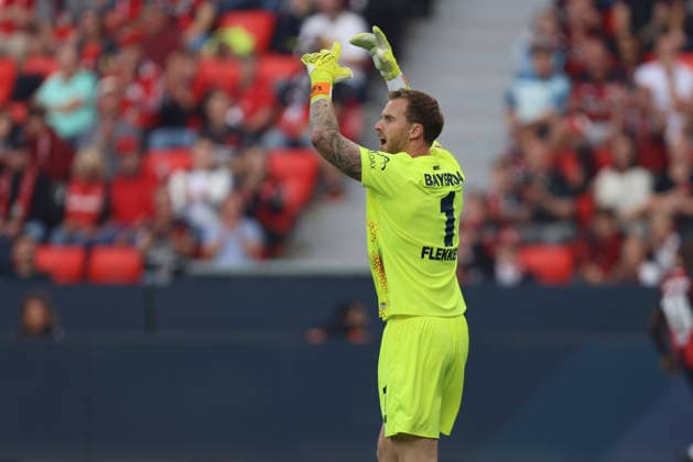 Torwart Mark Flekken (Bayer 04 Leverkusen) gestikuliert, Gestik waehrend des Spiels der 1. Bundesliga zwischen Bayer 04 Leverkusen und 1. FC Union Berlin, BayArena am 05. September 2026 in Leverkusen, Deutschland. (Foto von Oliver Kaelke DeFodi Images) +++ Torwart Mark Flekken (Bayer 04 Leverkusen) gestures during the Bundesliga match between Bayer 04 Leverkusen and 1. FC Union Berlin at BayArena on September 5, 2026 in Leverkusen, Germany. (Photo by Oliver Kaelke DeFodi Images) DFB DFL REGULATIONS PROHIBIT ANY USE OF PHOTOGRAPHS AS IMAGE SEQUENCES AND OR QUASI-VIDEO. (Photo by Oliver Kaelke DeFodi Images) - *** Goalkeeper Mark Flekken of Bayer 04 Leverkusen gestures during the Bundesliga match between Bayer 04 Leverkusen and 1. FC Union Berlin, BayArena on September 5, 2026, in Leverkusen, Germany. Photo by Oliver Kaelke, DeFodi Images. Goalkeeper Mark Flekken of Bayer 04 Leverkusen gestures during the Bundesliga match between Bayer 04 Leverkusen and 1. FC Union Berlin at BayArena on September 5, 2026 in Leverkusen, Germany. Photo by Oliver Kaelke, DeFodi Images. DFB and DFL regulations prohibit any use of photographs as image sequences and or quasi-video. Photo by Oliver Kaelke, DeFodi Images