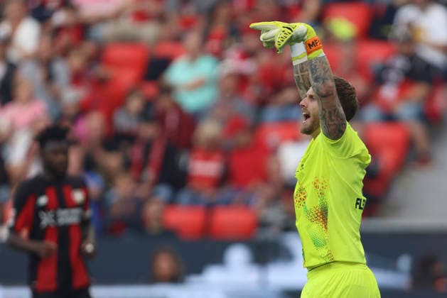 Torwart Mark Flekken (Bayer 04 Leverkusen) gestikuliert, Gestik waehrend des Spiels der 1. Bundesliga zwischen Bayer 04 Leverkusen und 1. FC Union Berlin, BayArena am 05. September 2026 in Leverkusen, Deutschland. (Foto von Oliver Kaelke DeFodi Images) +++ Torwart Mark Flekken (Bayer 04 Leverkusen) gestures during the Bundesliga match between Bayer 04 Leverkusen and 1. FC Union Berlin at BayArena on September 5, 2026 in Leverkusen, Germany. (Photo by Oliver Kaelke DeFodi Images) DFB DFL REGULATIONS PROHIBIT ANY USE OF PHOTOGRAPHS AS IMAGE SEQUENCES AND OR QUASI-VIDEO. (Photo by Oliver Kaelke DeFodi Images) - *** Goalkeeper Mark Flekken of Bayer 04 Leverkusen gestures during the Bundesliga match between Bayer 04 Leverkusen and 1. FC Union Berlin, BayArena on September 5, 2026, in Leverkusen, Germany. Photo by Oliver Kaelke, DeFodi Images. Goalkeeper Mark Flekken of Bayer 04 Leverkusen gestures during the Bundesliga match between Bayer 04 Leverkusen and 1. FC Union Berlin at BayArena on September 5, 2026 in Leverkusen, Germany. Photo by Oliver Kaelke, DeFodi Images. DFB and DFL regulations prohibit any use of photographs as image sequences and or quasi-video. Photo by Oliver Kaelke, DeFodi Images