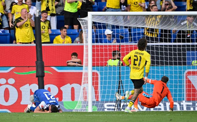 TOR zum 2:3 Eigentor Albian Hajdari TSG 1899 Hoffenheim (21) gegen Torwart Oliver Baumann TSG 1899 Hoffenheim (01) enttaeuscht TSG 1899 Hoffenheim vs Borussia Dortmund BVB 05.09.2026 DFL REGULATIONS PROHIBIT ANY USE OF PHOTOGRAPHS AS IMAGE SEQUENCES AND OR QUASI-VIDEO TSG 1899 Hoffenheim vs Borussia Dortmund BVB *** GOAL: 2-3 (own goal by Albian Hajdari, TSG 1899 Hoffenheim 21) against goalkeeper Oliver Baumann (TSG 1899 Hoffenheim 01) – a disappointment. TSG 1899 Hoffenheim vs. Borussia Dortmund (BVB), September 5, 2026 DFL regulations prohibit any use of photographs as image sequences and or quasi-video. TSG 1899 Hoffenheim vs. Borussia Dortmund (BVB)