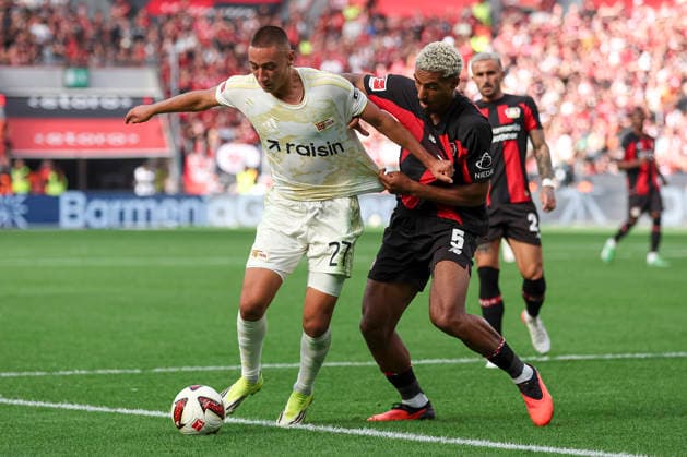 Marin Ljubicic (1.FC Union Berlin) und Loic Bade (Bayer 04 Leverkusen) im Zweikampf waehrend des Spiels der 1. Bundesliga zwischen Bayer 04 Leverkusen und 1. FC Union Berlin, BayArena am 05. September 2026 in Leverkusen, Deutschland. (Foto von Oliver Kaelke DeFodi Images) +++ Marin Ljubicic (1.FC Union Berlin) und Loic Bade (Bayer 04 Leverkusen) battle for the ball during the Bundesliga match between Bayer 04 Leverkusen and 1. FC Union Berlin at BayArena on September 5, 2026 in Leverkusen, Germany. (Photo by Oliver Kaelke DeFodi Images) DFB DFL REGULATIONS PROHIBIT ANY USE OF PHOTOGRAPHS AS IMAGE SEQUENCES AND OR QUASI-VIDEO. (Photo by Oliver Kaelke DeFodi Images) - *** Marin Ljubicic of 1 FC Union Berlin and Loic Bade of Bayer 04 Leverkusen battle for the ball during the Bundesliga match between Bayer 04 Leverkusen and 1 FC Union Berlin at the BayArena on September 5, 2026, in Leverkusen, Germany. Photo by Oliver Kaelke, DeFodi Images. Marin Ljubicic of 1. FC Union Berlin and Loic Bade of Bayer 04 Leverkusen battle for the ball during the Bundesliga match between Bayer 04 Leverkusen and 1. FC Union Berlin at BayArena on September 5, 2026 in Leverkusen, Germany. Photo by Oliver Kaelke, DeFodi Images. DFB and DFL regulations prohibit any use of photographs as image sequences and or quasi-video. Photo by Oliver Kaelke, DeFodi Images.