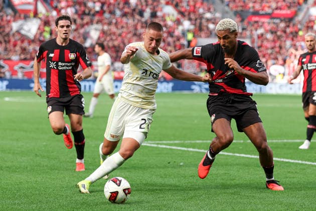 Marin Ljubicic (1.FC Union Berlin) und Loic Bade (Bayer 04 Leverkusen) im Zweikampf waehrend des Spiels der 1. Bundesliga zwischen Bayer 04 Leverkusen und 1. FC Union Berlin, BayArena am 05. September 2026 in Leverkusen, Deutschland. (Foto von Oliver Kaelke DeFodi Images) +++ Marin Ljubicic (1.FC Union Berlin) und Loic Bade (Bayer 04 Leverkusen) battle for the ball during the Bundesliga match between Bayer 04 Leverkusen and 1. FC Union Berlin at BayArena on September 5, 2026 in Leverkusen, Germany. (Photo by Oliver Kaelke DeFodi Images) DFB DFL REGULATIONS PROHIBIT ANY USE OF PHOTOGRAPHS AS IMAGE SEQUENCES AND OR QUASI-VIDEO. (Photo by Oliver Kaelke DeFodi Images) - *** Marin Ljubicic of 1 FC Union Berlin and Loic Bade of Bayer 04 Leverkusen battle for the ball during the Bundesliga match between Bayer 04 Leverkusen and 1 FC Union Berlin at the BayArena on September 5, 2026, in Leverkusen, Germany. Photo by Oliver Kaelke, DeFodi Images. Marin Ljubicic of 1. FC Union Berlin and Loic Bade of Bayer 04 Leverkusen battle for the ball during the Bundesliga match between Bayer 04 Leverkusen and 1. FC Union Berlin at BayArena on September 5, 2026 in Leverkusen, Germany. Photo by Oliver Kaelke, DeFodi Images. DFB and DFL regulations prohibit any use of photographs as image sequences and or quasi-video. Photo by Oliver Kaelke, DeFodi Images.