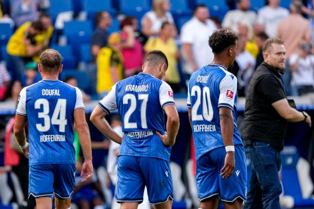 v.li.: Vladimir Coufal (Hoffenheim, 34), Andrej Kramaric (Hoffenheim, 27), Bambase Conte (Hoffenheim, 20), Spieler der TSG 1899 Hoffenheim, enttäuscht über die Niederlage, Enttäuschung nach dem Schlusspfiff, Highlight, Verlierer, verloren, Frustration, disappointed, pessimistisch, 05.09.2026, Sinsheim (Deutschland), Fussball, Bundesliga, TSG 1899 Hoffenheim - Borussia Dortmund, DFB DFL REGULATIONS PROHIBIT ANY USE OF PHOTOGRAPHS AS IMAGE SEQUENCES AND OR QUASI-VIDEO. *** Vladimir Coufal, Hoffenheim, 34; Andrej Kramaric, Hoffenheim, 27; Bambase Conte, Hoffenheim, 20, TSG 1899 Hoffenheim players, disappointed by the loss, disappointment after the final whistle, highlight, losers, lost, frustration, disappointed, pessimistic, September 5, 2026, Sinsheim, Germany, soccer, Bundesliga, TSG 1899 Hoffenheim vs. Borussia Dortmund, DFB and DFL regulations prohibit any use of photographs as image sequences and or quasi-video xozx