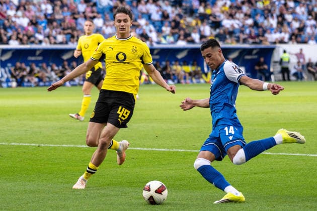 Luca Reggiani (Borussia Dortmund) und Adam Daghim (TSG 1899 Hoffenheim). xettx, Deutschland, Sinsheim, 05.09.2026, Fussball, Bundesliga: TSG 1899 Hoffenheim vs Borussia Dortmund, Saison 2026 2027, 2. Spieltag, SNP Arena DFL DFB REGULATIONS PROHIBIT ANY USE OF PHOTOGRAPHS AS IMAGE SEQUENCES AND OR QUASI-VIDEO. *** Luca Reggiani, Borussia Dortmund, and Adam Daghim, TSG 1899 Hoffenheim, xettx, Germany, Sinsheim, September 5, 2026, Soccer, Bundesliga: TSG 1899 Hoffenheim vs. Borussia Dortmund, 2026–2027 season, Matchday 2, SNP Arena. DFL and DFB regulations prohibit any use of photographs as image sequences and or quasi-video.