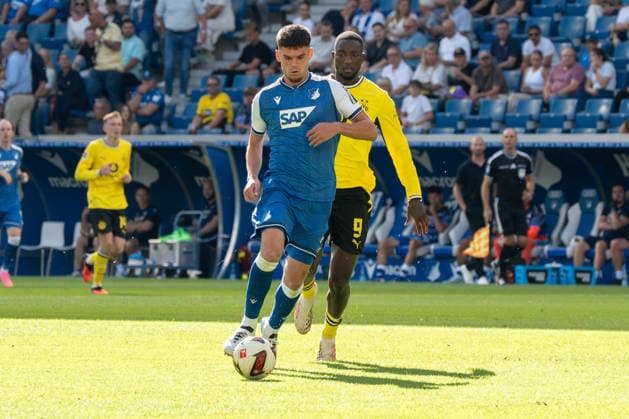 1. Bundesliga: TSG Hoffenheim vs Borussia Dortmund, 05.09.2026 Albian Hajdari (TSG Hoffenheim, 21) behauptet vor Serhou Guirassy (Borussia Dortmund, 9) den Ball 1. Bundesliga: TSG Hoffenheim vs Borussia Dortmund, SNP Arena, 05.09.2026 DFB DFL REGULATIONS PROHIBIT ANY USE OF PHOTOGRAPHS AS IMAGE SEQUENCES AND OR QUASI-VIDEO. *** 1 Bundesliga: TSG Hoffenheim vs. Borussia Dortmund, September 5, 2026. Albian Hajdari (TSG Hoffenheim, No. 21) wins the ball from Serhou Guirassy (Borussia Dortmund, No. 9). 1 Bundesliga: TSG Hoffenheim vs. Borussia Dortmund, SNP Arena, September 5, 2026. DFB and DFL regulations prohibit any use of photographs as image sequences and or quasi-video. Copyright: xBEAUTIFULxSPORTS Hillx
