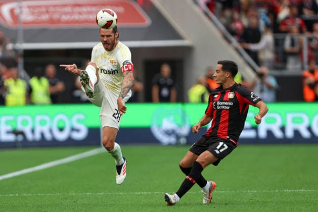 Christopher Trimmel (1.FC Union Berlin) und Lucas Vazquez (Bayer 04 Leverkusen) im Zweikampf waehrend des Spiels der 1. Bundesliga zwischen Bayer 04 Leverkusen und 1. FC Union Berlin, BayArena am 05. September 2026 in Leverkusen, Deutschland. (Foto von Oliver Kaelke DeFodi Images) +++ Christopher Trimmel (1.FC Union Berlin) und Lucas Vazquez (Bayer 04 Leverkusen) battle for the ball during the Bundesliga match between Bayer 04 Leverkusen and 1. FC Union Berlin at BayArena on September 5, 2026 in Leverkusen, Germany. (Photo by Oliver Kaelke DeFodi Images) DFB DFL REGULATIONS PROHIBIT ANY USE OF PHOTOGRAPHS AS IMAGE SEQUENCES AND OR QUASI-VIDEO. (Photo by Oliver Kaelke DeFodi Images) - *** Christopher Trimmel of 1 FC Union Berlin and Lucas Vazquez of Bayer 04 Leverkusen battle for the ball during the Bundesliga match between Bayer 04 Leverkusen and 1 FC Union Berlin at the BayArena on September 5, 2026, in Leverkusen, Germany. Photo by Oliver Kaelke, DeFodi Images. Christopher Trimmel of 1. FC Union Berlin and Lucas Vázquez of Bayer 04 Leverkusen battle for the ball during the Bundesliga match between Bayer 04 Leverkusen and 1. FC Union Berlin at BayArena on September 5, 2026 in Leverkusen, Germany. Photo by Oliver Kaelke, DeFodi Images. DFB and DFL regulations prohibit any use of photographs as image sequences and or quasi-video. Photo by Oliver Kaelke, DeFodi Images.