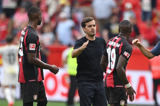Schlussjubel Bayer Leverkusen, Jubel, jubeln, Freude, cheers, v.l. Christian KOFANE (LEV), Trainer Carles MARTINEZ (LEV) , Mussa DIABY (LEV) Fussball 1. Bundesliga, 2.Spieltag, matchday2, Bayer Leverkusen (LEV) - 1. FC Union Berlin (UB) 4-0 am 18.04.2026 in Leverkusen Deutschland. DFL regulations prohibit any use of photographs as image sequences and or quasi-video Â *** Bayer Leverkusen s victory celebration, celebration, cheering, joy, cheers, from left: Christian KOFANE (LEV), Coach Carles MARTINEZ (LEV), Mussa DIABY (LEV); Soccer, 1. Bundesliga, Matchday 2, matchday2, Bayer Leverkusen LEV 1 FC Union Berlin UB 4–0 on April 18, 2026, in Leverkusen, Germany. DFL regulations prohibit any use of photographs as image sequences and or quasi-video.