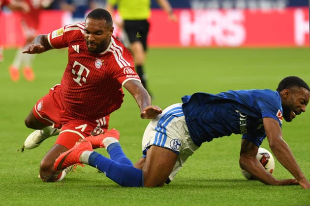 Jonathan Tah (FC Bayern Muenchen) und Satoshi Tanaka (FC Schalke 04) im Zweikampf waehrend des Spiels der 1. Bundesliga zwischen FC Schalke 04 und FC Bayern Muenchen, Veltins-Arena am 05. September 2026 in Gelsenkirchen, Deutschland. (Foto von Ralf Treese DeFodi Images) +++ Jonathan Tah (FC Bayern Muenchen) und Satoshi Tanaka (FC Schalke 04) battle for the ball during the Bundesliga match between FC Schalke 04 and FC Bayern Muenchen at Veltins-Arena on September 5, 2026 in Gelsenkirchen, Germany. (Photo by Ralf Treese DeFodi Images) DFB DFL REGULATIONS PROHIBIT ANY USE OF PHOTOGRAPHS AS IMAGE SEQUENCES AND OR QUASI-VIDEO. (Photo by Ralf Treese DeFodi Images) - *** Jonathan Tah of FC Bayern Munich and Satoshi Tanaka of FC Schalke 04 battle for the ball during the Bundesliga match between FC Schalke 04 and FC Bayern Munich at Veltins Arena on September 5, 2026, in Gelsenkirchen, Germany. Photo by Ralf Treese, DeFodi Images. Jonathan Tah of FC Bayern Munich and Satoshi Tanaka of FC Schalke 04 battle for the ball during the Bundesliga match between FC Schalke 04 and FC Bayern Munich at Veltins Arena on September 5, 2026 in Gelsenkirchen, Germany. Photo by Ralf Treese, DeFodi Images. DFB and DFL regulations prohibit any use of photographs as image sequences and or quasi-video. Photo by Ralf Treese, DeFodi Images.