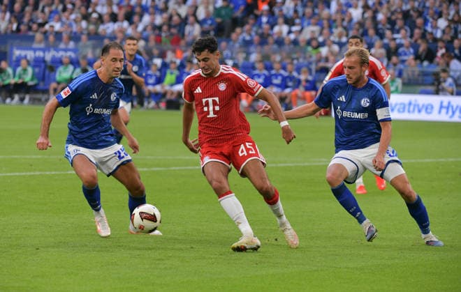 05.09.2026, xblx, Fussball 1.Bundesliga, FC Schalke 04 - FC Bayern München v.l. Nikola Katic (FC Schalke 04), Aleksandar Pavlovic (FC Bayern Muenchen), Timo Becker (FC Schalke 04) (DFL DFB REGULATIONS PROHIBIT ANY USE OF PHOTOGRAPHS as IMAGE SEQUENCES and or QUASI-VIDEO) Gelsenkirchen *** September 5, 2026, xblx, Soccer, Bundesliga 1, FC Schalke 04 vs. FC Bayern Munich, Nikola Katic (FC Schalke 04), Aleksandar Pavlovic (FC Bayern Munich), Timo Becker, FC Schalke 04. DFL and DFB regulations prohibit any use of photographs as image sequences and or quasi-video. Gelsenkirchen