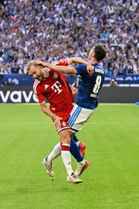 GELSENKIRCHEN, GERMANY; 05. SEPTEMBER: tackle between Konrad LAIMER (FC Bayern Munich 27) and Robin GOSENS (FC Schalke 8) during the Bundesliga Match between FC Schalke 04 vs. FC Bayern Munich at Matchday 2 at Veltins Arena DFL REGULATIONS PROHIBIT ANY USE OF PHOTOGRAPHS AS IMAGE SEQUENCES AND OR QUASI-VIDEO Copyright: xBEAUTIFULxSPORTS Goldbergx