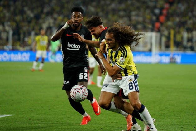 September 5, 2026, Kadikoy, Istanbul, Turkey: Matteo Guendouzi (C-R) of Fenerbahce in action against Salih Ozcan (C-back) and Amir Murillo (L) of Besiktas during the Turkish Super League 2026 27 match between Fenerbahce and Besiktas at Sukru Saracoglu Stadium in Istanbul, Turkey, on September 5, 2026. Kadikoy Turkey - ZUMAu194 20260905_zip_u194_018 Copyright: xTolgaxUluturkx