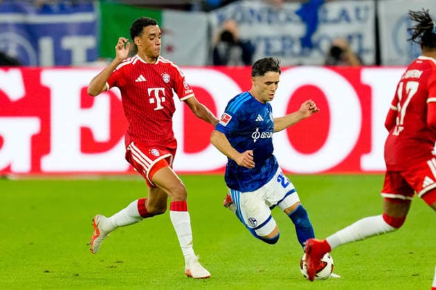 Jamal Musiala (FC Bayern Muenchen) und Soufiane El-Faouzi (FC Schalke 04) im Zweikampf waehrend des Spiels der 1. Bundesliga zwischen FC Schalke 04 und FC Bayern Muenchen, Veltins-Arena am 05. September 2026 in Gelsenkirchen, Deutschland. (Foto von Alex Gottschalk DeFodi Images) +++ Jamal Musiala (FC Bayern Muenchen) und Soufiane El-Faouzi (FC Schalke 04) battle for the ball during the Bundesliga match between FC Schalke 04 and FC Bayern Muenchen at Veltins-Arena on September 5, 2026 in Gelsenkirchen, Germany. (Photo by Alex Gottschalk DeFodi Images) DFB DFL REGULATIONS PROHIBIT ANY USE OF PHOTOGRAPHS AS IMAGE SEQUENCES AND OR QUASI-VIDEO. (Photo by Alex Gottschalk DeFodi Images) - *** Jamal Musiala of FC Bayern Munich and Soufiane El Faouzi of FC Schalke 04 battle for the ball during the Bundesliga match between FC Schalke 04 and FC Bayern Munich at Veltins Arena on September 5, 2026, in Gelsenkirchen, Germany Photo by Alex Gottschalk DeFodi Images Jamal Musiala of FC Bayern Munich and Soufiane El Faouzi of FC Schalke 04 battle for the ball during the Bundesliga match between FC Schalke 04 and FC Bayern Munich at Veltins Arena on September 5, 2026 in Gelsenkirchen, Germany. Photo by Alex Gottschalk, DeFodi Images. DFB and DFL regulations prohibit any use of photographs as image sequences and or quasi-video. Photo by Alex Gottschalk, DeFodi Images.