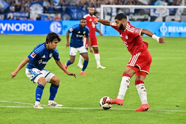 GELSENKIRCHEN, GERMANY; 05. SEPTEMBER: tackle between Satoshi TANAKA (FC Schalke 13) and Ismael SAIBARI (FC Bayern Munich 34) during the Bundesliga Match between FC Schalke 04 vs. FC Bayern Munich at Matchday 2 at Veltins Arena DFL REGULATIONS PROHIBIT ANY USE OF PHOTOGRAPHS AS IMAGE SEQUENCES AND OR QUASI-VIDEO Copyright: xBEAUTIFULxSPORTS Goldbergx