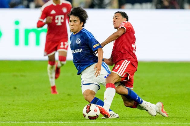 Satoshi Tanaka (FC Schalke 04) und Jamal Musiala (FC Bayern Muenchen) im Zweikampf waehrend des Spiels der 1. Bundesliga zwischen FC Schalke 04 und FC Bayern Muenchen, Veltins-Arena am 05. September 2026 in Gelsenkirchen, Deutschland. (Foto von Alex Gottschalk DeFodi Images) +++ Satoshi Tanaka (FC Schalke 04) und Jamal Musiala (FC Bayern Muenchen) battle for the ball during the Bundesliga match between FC Schalke 04 and FC Bayern Muenchen at Veltins-Arena on September 5, 2026 in Gelsenkirchen, Germany. (Photo by Alex Gottschalk DeFodi Images) DFB DFL REGULATIONS PROHIBIT ANY USE OF PHOTOGRAPHS AS IMAGE SEQUENCES AND OR QUASI-VIDEO. (Photo by Alex Gottschalk DeFodi Images) - *** Satoshi Tanaka of FC Schalke 04 and Jamal Musiala of FC Bayern Munich battle for the ball during the Bundesliga match between FC Schalke 04 and FC Bayern Munich at Veltins Arena on September 5, 2026, in Gelsenkirchen, Germany. Photo by Alex Gottschalk, DeFodi Images. Satoshi Tanaka of FC Schalke 04 and Jamal Musiala of FC Bayern Munich battle for the ball during the Bundesliga match between FC Schalke 04 and FC Bayern Munich at Veltins Arena on September 5, 2026 in Gelsenkirchen, Germany. Photo by Alex Gottschalk, DeFodi Images. DFB and DFL regulations prohibit any use of photographs as image sequences and or quasi-video. Photo by Alex Gottschalk, DeFodi Images