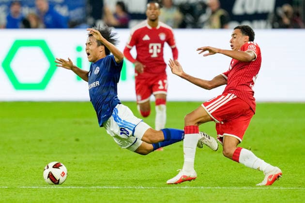 Satoshi Tanaka (FC Schalke 04) und Jamal Musiala (FC Bayern Muenchen) im Zweikampf waehrend des Spiels der 1. Bundesliga zwischen FC Schalke 04 und FC Bayern Muenchen, Veltins-Arena am 05. September 2026 in Gelsenkirchen, Deutschland. (Foto von Alex Gottschalk DeFodi Images) +++ Satoshi Tanaka (FC Schalke 04) und Jamal Musiala (FC Bayern Muenchen) battle for the ball during the Bundesliga match between FC Schalke 04 and FC Bayern Muenchen at Veltins-Arena on September 5, 2026 in Gelsenkirchen, Germany. (Photo by Alex Gottschalk DeFodi Images) DFB DFL REGULATIONS PROHIBIT ANY USE OF PHOTOGRAPHS AS IMAGE SEQUENCES AND OR QUASI-VIDEO. (Photo by Alex Gottschalk DeFodi Images) - *** Satoshi Tanaka of FC Schalke 04 and Jamal Musiala of FC Bayern Munich battle for the ball during the Bundesliga match between FC Schalke 04 and FC Bayern Munich at Veltins Arena on September 5, 2026, in Gelsenkirchen, Germany. Photo by Alex Gottschalk, DeFodi Images. Satoshi Tanaka of FC Schalke 04 and Jamal Musiala of FC Bayern Munich battle for the ball during the Bundesliga match between FC Schalke 04 and FC Bayern Munich at Veltins Arena on September 5, 2026 in Gelsenkirchen, Germany. Photo by Alex Gottschalk, DeFodi Images. DFB and DFL regulations prohibit any use of photographs as image sequences and or quasi-video. Photo by Alex Gottschalk, DeFodi Images
