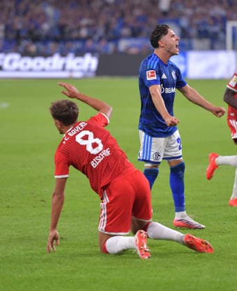 05.09.2026, xblx, Fussball 1.Bundesliga, FC Schalke 04 - FC Bayern München v.l. Harry Kane (FC Bayern Muenchen), Soufiane El-Faouzi (FC Schalke 04) (DFL DFB REGULATIONS PROHIBIT ANY USE OF PHOTOGRAPHS as IMAGE SEQUENCES and or QUASI-VIDEO) Gelsenkirchen *** September 5, 2026, xblx, Soccer, Bundesliga 1, FC Schalke 04 vs. FC Bayern Munich, Harry Kane (FC Bayern Munich), Soufiane El Faouzi (FC Schalke 04). DFL and DFB regulations prohibit any use of photographs as image sequences and or quasi-video. Gelsenkirchen