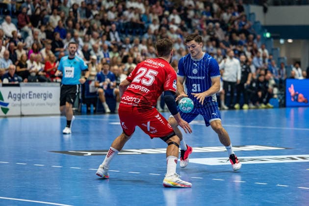 Opel Handball Bundesliga, VfL Gummersbach - MT Melsungen, 05.09.2026 Olle Forsell Schefvert (MT Melsungen 25), Nikola RoganoviÄ‡ (VfL Gummersbach 23), ; Opel Handball Bundesliga, VfL Gummersbach - MT Melsungen, 05.09.2026 Copyright: xBEAUTIFULxSPORTS Erlhofx
