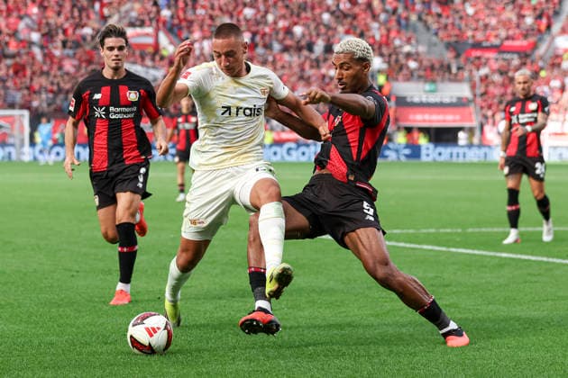 Marin Ljubicic (1.FC Union Berlin) und Loic Bade (Bayer 04 Leverkusen) im Zweikampf waehrend des Spiels der 1. Bundesliga zwischen Bayer 04 Leverkusen und 1. FC Union Berlin, BayArena am 05. September 2026 in Leverkusen, Deutschland. (Foto von Oliver Kaelke DeFodi Images) +++ Marin Ljubicic (1.FC Union Berlin) und Loic Bade (Bayer 04 Leverkusen) battle for the ball during the Bundesliga match between Bayer 04 Leverkusen and 1. FC Union Berlin at BayArena on September 5, 2026 in Leverkusen, Germany. (Photo by Oliver Kaelke DeFodi Images) DFB DFL REGULATIONS PROHIBIT ANY USE OF PHOTOGRAPHS AS IMAGE SEQUENCES AND OR QUASI-VIDEO. (Photo by Oliver Kaelke DeFodi Images) - *** Marin Ljubicic of 1 FC Union Berlin and Loic Bade of Bayer 04 Leverkusen battle for the ball during the Bundesliga match between Bayer 04 Leverkusen and 1 FC Union Berlin at the BayArena on September 5, 2026, in Leverkusen, Germany. Photo by Oliver Kaelke, DeFodi Images. Marin Ljubicic of 1. FC Union Berlin and Loic Bade of Bayer 04 Leverkusen battle for the ball during the Bundesliga match between Bayer 04 Leverkusen and 1. FC Union Berlin at BayArena on September 5, 2026 in Leverkusen, Germany. Photo by Oliver Kaelke, DeFodi Images. DFB and DFL regulations prohibit any use of photographs as image sequences and or quasi-video. Photo by Oliver Kaelke, DeFodi Images.