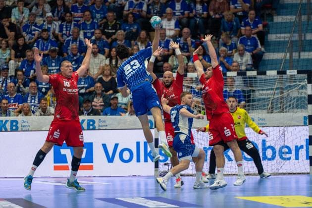 Nicola Roganovic, Rueckraum, (VfL Gummersbach 23), Dainis KriÅ¡topÄns, Rueckraum, (MT Melsungen 10), Johannes Golla, Kreislaeufer, (MT Melsungen 14), VfL Gummersbach vs. MT Melsungen,, Opel Handball Bundesliga, Herren , 3. Spieltag, 05.09.2026 Gummersbach NRW Deutschland