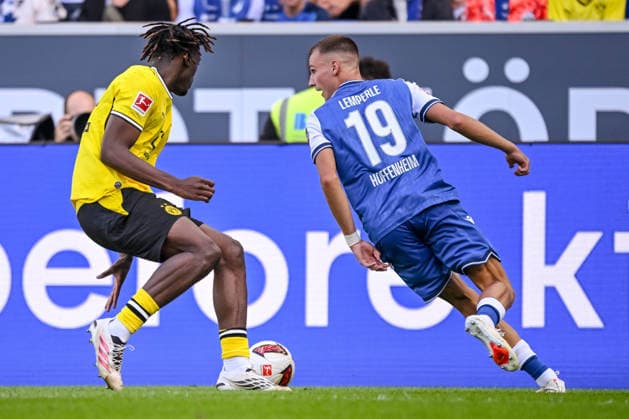 Joane Gadou (Borussia Dortmund) und Tim Lemperle (TSG 1899 Hoffenheim) im Zweikampf waehrend des spiels der 1. Bundesliga zwischen TSG Hoffenheim und Borussia Dortmund, SNP Arena am 05. September 2026 in Sinsheim, Deutschland. (Foto von Harry Langer DeFodi Images) +++ Joane Gadou (Borussia Dortmund) und Tim Lemperle (TSG 1899 Hoffenheim) battle for the ball during the Bundesliga match between TSG Hoffenheim and Borussia Dortmund at SNP Arena on September 5, 2026 in Sinsheim, Germany. (Photo by Harry Langer DeFodi Images) DFB DFL REGULATIONS PROHIBIT ANY USE OF PHOTOGRAPHS AS IMAGE SEQUENCES AND OR QUASI-VIDEO. (Photo by Harry Langer DeFodi Images) DFB DFL REGULATIONS PROHIBIT ANY USE OF PHOTOGRAPHS AS IMAGE SEQUENCES AND OR QUASI-VIDEO. - *** Joane Gadou of Borussia Dortmund and Tim Lemperle of TSG 1899 Hoffenheim in a tackle during the Bundesliga 1 match between TSG Hoffenheim and Borussia Dortmund, SNP Arena on September 5, 2026, in Sinsheim, Germany. Photo by Harry Langer, DeFodi Images. Joane Gadou of Borussia Dortmund and Tim Lemperle of TSG 1899 Hoffenheim battle for the ball during the Bundesliga match between TSG Hoffenheim and Borussia Dortmund at SNP Arena on September 5, 2026 in Sinsheim, Germany. Photo by Harry Langer, DeFodi Images. DFB and DFL regulations prohibit any use of photographs as image sequences and or quasi-video. Photo by Harry Langer, DeFodi Images. DFB and DFL regulations prohibit any use of photographs as imSEQUENCES AND OR QUASI-VIDEO