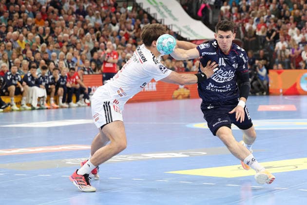 05.09.2026, xBHAx, Handball, Opel HBL, Saison 2026 2027, 1.HBL, SG Flensburg-Handewitt - HC Erlangen, GGW Arena: Aymeric Minne (SG Flensburg-Handewitt 44) im Angriff gegen Florian Scheerer (HC Erlangen 10) Schleswig-Holstein Deutschkand