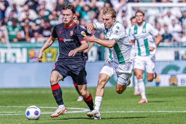 GRONINGEN - Sondre Orjasaeter of FC Twente battles for possession with Jorg Schreuders of FC Groningen during the Eredivisie match between FC Groningen and FC Twente at the Euroborg on 06 September 2026 in Groningen, the Netherlands. MARCEL TER BALS ANP Eredivisie 2026 27 xVIxANPxSportx xMarcelxterxBalsxIVx 567359620 originalFilename: 567359620.jpg
