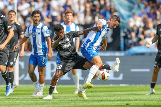 06.09.2026, xtgx, Fussball - 2.Bundesliga Hertha BSC Berlin - 1.FC Magdeburg emspor, v.l. Moritz Broni Kwarteng (Magdeburg, 10), Paul Seguin (Hertha, 30) Zweikampf, Duell, Kampf, tackle (DFL DFB REGULATIONS PROHIBIT ANY USE OF PHOTOGRAPHS as IMAGE SEQUENCES and or QUASI-VIDEO) Berlin *** September 6, 2026, xtgx, Soccer, 2. Bundesliga, Hertha BSC Berlin 1 FC Magdeburg emspor, from left: Moritz Broni, Kwarteng, Magdeburg, 10, Paul Seguin, Hertha, 30, tackle, duel, battle, DFL and DFB regulations prohibit any use of photographs as image sequences and or quasi-video, Berlin