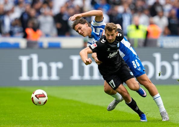 Alexander Nollenberger (1. FC Magdeburg, 17) im Zweikampf mit Soufian Gouram (Hertha BSC, 33) GER, Hertha BSC vs 1. FC Magdeburg, 2. Bundesliga, 4. Spieltag, Saison 2026-27, Olympiastadion, Berlin, 06.09.2026 DFL REGULATIONS PROHIBIT ANY USE OF PHOTOGRAPHS AS IMAGE SEQUENCES AND OR QUASI-VIDEO GER, Hertha BSC vs 1. FC Magdeburg, 2. Bundesliga, 4. Spieltag, Saison 2026-27, 06.09.2026 Berlin *** Alexander Nollenberger, 1 FC Magdeburg, 17, in a tackle with Soufian Gouram, Hertha BSC, 33 GER; Hertha BSC vs. 1 FC Magdeburg, 2. Bundesliga, Matchday 4, 2026–27 season, Olympiastadion, Berlin, September 6, 2026 DFL regulations prohibit any use of photographs as image sequences and or quasi-video (GER), Hertha BSC vs. 1 FC Magdeburg, 2. Bundesliga, Matchday 4, 2026–27 season, September 6, 2026, Berlin Copyright: xEibner-Pressefoto ScottxColemanx EP_SCN