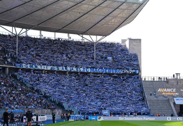 Fans der 1. FC Magdeburg jubeln auf der Tribuene. GER, Hertha BSC vs 1. FC Magdeburg, 2. Bundesliga, 4. Spieltag, Saison 2026-27, Olympiastadion, Berlin, 06.09.2026 DFL REGULATIONS PROHIBIT ANY USE OF PHOTOGRAPHS AS IMAGE SEQUENCES AND OR QUASI-VIDEO GER, Hertha BSC vs 1. FC Magdeburg, 2. Bundesliga, 4. Spieltag, Saison 2026-27, 06.09.2026 Berlin *** Fans of 1 FC Magdeburg cheer from the stands in GER; Hertha BSC vs. 1 FC Magdeburg, 2. Bundesliga, Matchday 4, 2026–27 season, Olympiastadion, Berlin, September 6, 2026 DFL regulations prohibit any use of photographs as image sequences and or quasi-video GER, Hertha BSC vs. 1 FC Magdeburg, 2. Bundesliga, Matchday 4, 2026–27 season, September 6, 2026, Berlin Copyright: xEibner-Pressefoto ScottxColemanx EP_SCN