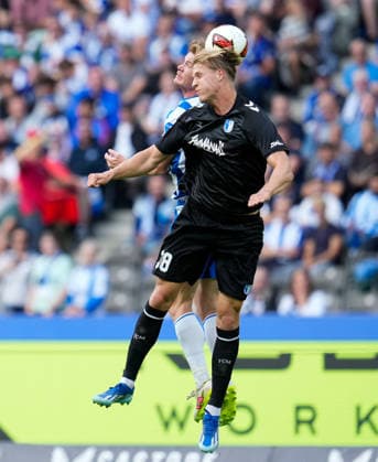 Sebastian Groenning (Hertha BSC, 17) und Luka-Mikael Hyrylaeinen (1. FC Magdeburg, 38) springen zum Kopfball. GER, Hertha BSC vs 1. FC Magdeburg, 2. Bundesliga, 4. Spieltag, Saison 2026-27, Olympiastadion, Berlin, 06.09.2026 DFL REGULATIONS PROHIBIT ANY USE OF PHOTOGRAPHS AS IMAGE SEQUENCES AND OR QUASI-VIDEO GER, Hertha BSC vs 1. FC Magdeburg, 2. Bundesliga, 4. Spieltag, Saison 2026-27, 06.09.2026 Berlin *** Sebastian Groenning of Hertha BSC, 17, and Luka Mikael Hyrylaeinen of 1 FC Magdeburg, 38, go up for a header in the German Bundesliga, Hertha BSC vs. 1 FC Magdeburg, 2. Bundesliga, Matchday 4, 2026–27 season, Olympiastadion, Berlin, September 6, 2026. DFL regulations prohibit any use of photographs as image sequences and or quasi-video. GER, Hertha BSC vs. 1 FC Magdeburg, 2. Bundesliga, Matchday 4, 2026–27 season, September 6, 2026, Berlin Copyright: xEibner-Pressefoto ScottxColemanx EP_SCN