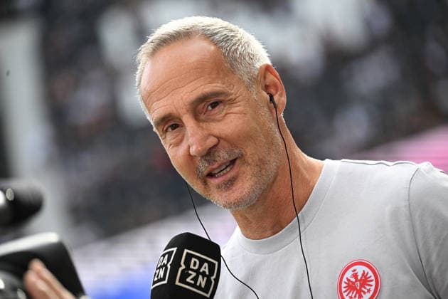 06.09.2026, xjhx, Fussball 1.Bundesliga, Eintracht Frankfurt - FC Augsburg v.l. Trainer Adolf Adi Hütter (Eintracht Frankfurt) mit Mikrofon im TV Interview bei DAZN (DFL DFB REGULATIONS PROHIBIT ANY USE OF PHOTOGRAPHS as IMAGE SEQUENCES and or QUASI-VIDEO) Frankfurt am Main *** September 6, 2026, xjhx, Soccer, Bundesliga 1, Eintracht Frankfurt vs. FC Augsburg; Coach Adolf Adi Hütter of Eintracht Frankfurt giving a TV interview with a microphone on DAZN. DFL and DFB regulations prohibit any use of photographs as image sequences and or quasi-video. Frankfurt am Main