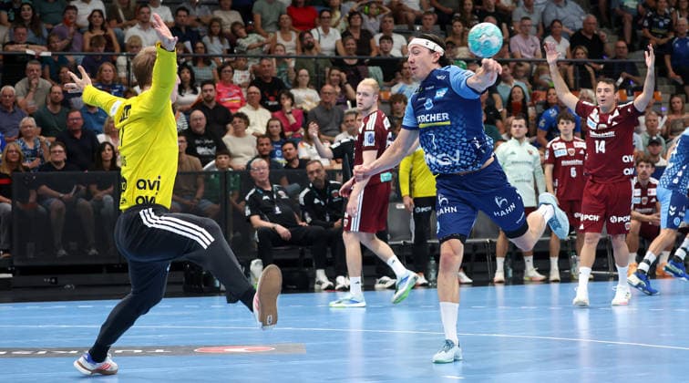 2026.09.06, Deutschland, Stuttgart, Handball TVB Stuttgart vs. Füchse Berlin, v.l. Lasse Ludwig (Berlin), KAsper Thorsen Lien (TVB)