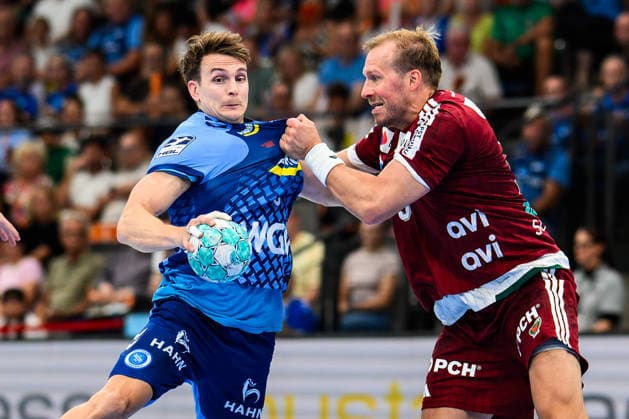 TVB Stuttgart - Füchse Berlin Handball: 1. Bundesliga, Herren, Saison 2026 2027, TVB Stuttgart - Füchse Berlin, Porsche Arena. Stuttgarts Max Häfner in Aktion gegen Berlins Max Darj. Stuttgart Porsche Arena Baden-Württemberg Deutschland