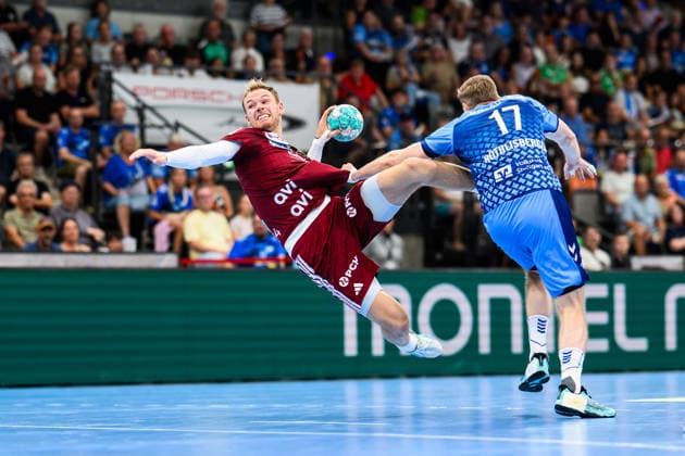 TVB Stuttgart - Füchse Berlin Handball: 1. Bundesliga, Herren, Saison 2026 2027, TVB Stuttgart - Füchse Berlin, Porsche Arena. Berlins Mathias Gidsel in Aktion gegen Stuttgarts Samuel Röthlisberger. Stuttgart Porsche Arena Baden-Württemberg Deutschland
