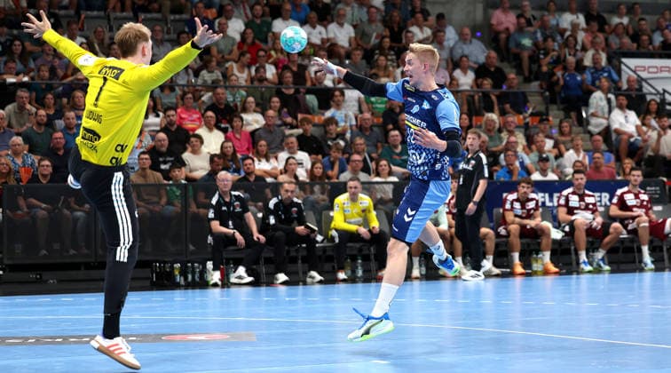 2026.09.06, Deutschland, Stuttgart, Handball TVB Stuttgart vs. Füchse Berlin, v.l. Lasse Ludwig (Berlin), Torben Matzken (TVB)