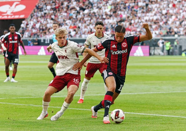 06.09.2026, xovx, Fußball Fußball Bundesliga, Eintracht Frankfurt - FC Augsburg v.l. Hennes Behrens (FC Augsburg), Fabian Rieder (FC Augsburg), Younes Ebnoutalib (Eintracht Frankfurt) (DFL DFB REGULATIONS PROHIBIT ANY USE OF PHOTOGRAPHS as IMAGE SEQUENCES and or QUASI-VIDEO) emspor Frankfurt *** September 6, 2026, xovx, Soccer, Bundesliga, Eintracht Frankfurt vs. FC Augsburg (Hennes Behrens, FC Augsburg), Fabian Rieder, FC Augsburg; Younes Ebnoutalib, Eintracht Frankfurt; DFL; DFB; REGULATIONS PROHIBIT ANY USE OF PHOTOGRAPHS AS IMAGE SEQUENCES AND OR QUASI-VIDEO; Eintracht Frankfurt
