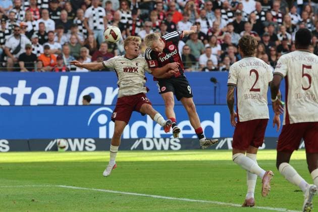 Tor zum 1:0 per Kopf durch Jonathan Burkhardt, Jonathan Michael ãJonnyÒ Burkardt, Jonny Burkardt (Eintracht Frankfurt , Nr. 9) gegen Robin Fellhauer (FC Augsburg, 19) , Eintracht Frankfurt - FC Augsburg, Bundesliga, BL, Saison 2026 2027, 2. Spiel, 06.09.2026, Frankfurt Deutsche Bank Park Deutschland *** Goal to make it 1–0, scored with a header by Jonathan Burkhardt, Jonathan Michael Jonny Burkardt, Jonny Burkardt of Eintracht Frankfurt, No. 9, against Robin Fellhauer of FC Augsburg, 19, Eintracht Frankfurt vs. FC Augsburg, Bundesliga, BL, 2026–2027 season, Match 2, September 6, 2026, Frankfurt, Deutsche Bank Park, Germany