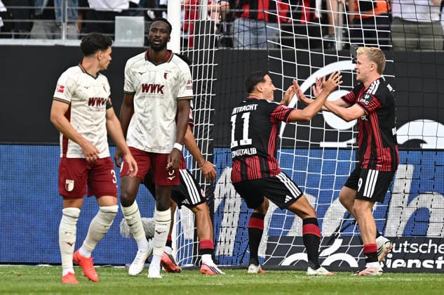 06.09.2026, xfux, Fussball 1.Bundesliga, Eintracht Frankfurt - FC Augsburg, v.l. Fabian Rieder (FC Augsburg), Chrislain Iris Aurel Matsima (FC Augsburg) enttaeuscht, enttaeuscht schauend, dissapointed, Younes Ebnoutalib (Eintracht Frankfurt), Torschuetze Torschütze Jonathan Burkardt (Eintracht Frankfurt) Torjubel, Jubel, Goal celebration, celebrate the goal zum 1:0 jubelnd bejubelt jubelt jubeln Jubel (DFL DFB REGULATIONS PROHIBIT ANY USE OF PHOTOGRAPHS as IMAGE SEQUENCES and or QUASI-VIDEO) Frankfurt am Main *** September 6, 2026, xfux, Soccer, Bundesliga 1, Eintracht Frankfurt vs. FC Augsburg, from left: Fabian Rieder (FC Augsburg), Chrislain Iris Aurel Matsima (FC Augsburg) looking disappointed, Younes Ebnoutalib (Eintracht Frankfurt), goal scorer Jonathan Burkardt (Eintracht Frankfurt) celebrating a goal, celebration, goal celebration, celebrating the goal, 1–0, cheering, celebrated, cheers, DFL DFB REGULATIONS PROHIBIT ANY USE OF PHOTOGRAPHS as IMAGE SEQUENCES and or QUASI-VIDEO Frankfurt am Main